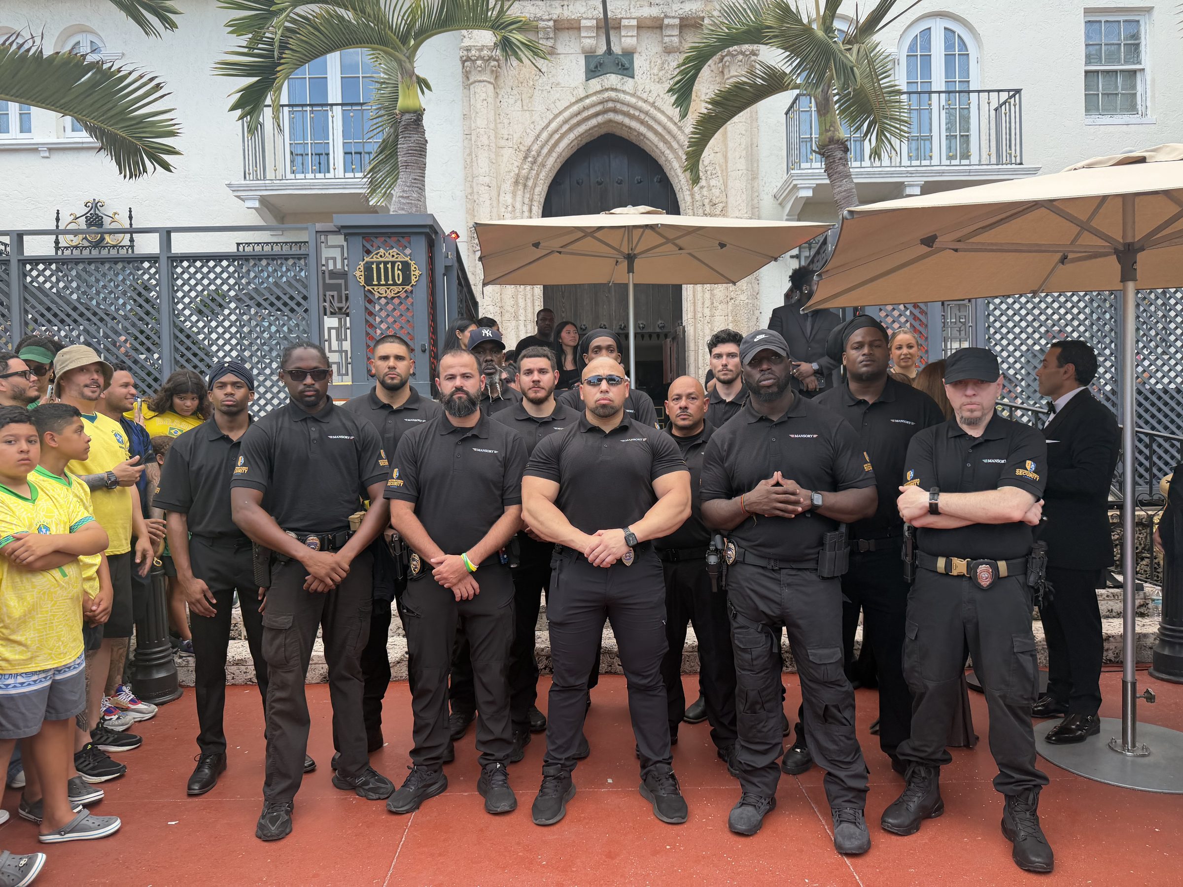 The full uniformed Spectrum Florida Security team on post at a luxury Miami venue